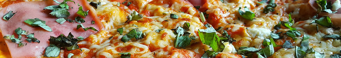 Eating Pizza at Tripoli Pizza & Bakery - Salisbury restaurant in Salisbury, MA.